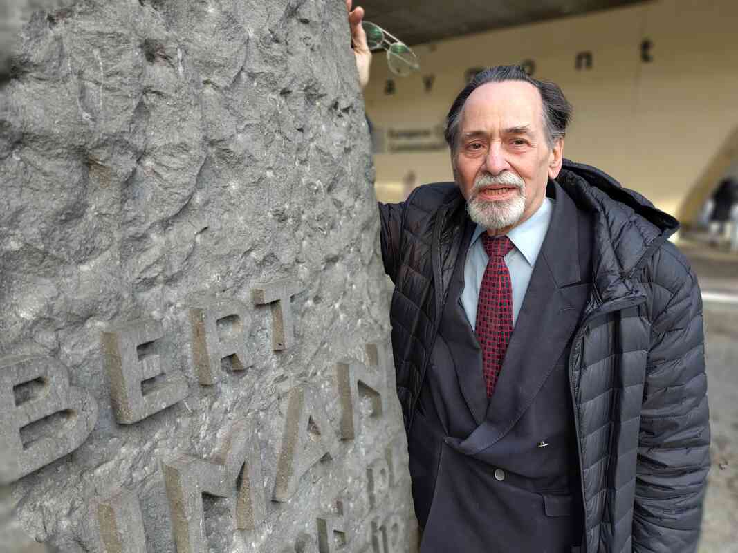 UK Brussels-based journalist David Heilbron Price, editor of EurDemocracy and Schuman.info, stands in front of the European Commission building.